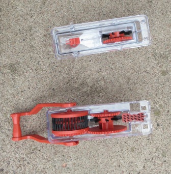The two halves of the cycle chain cleaning machine