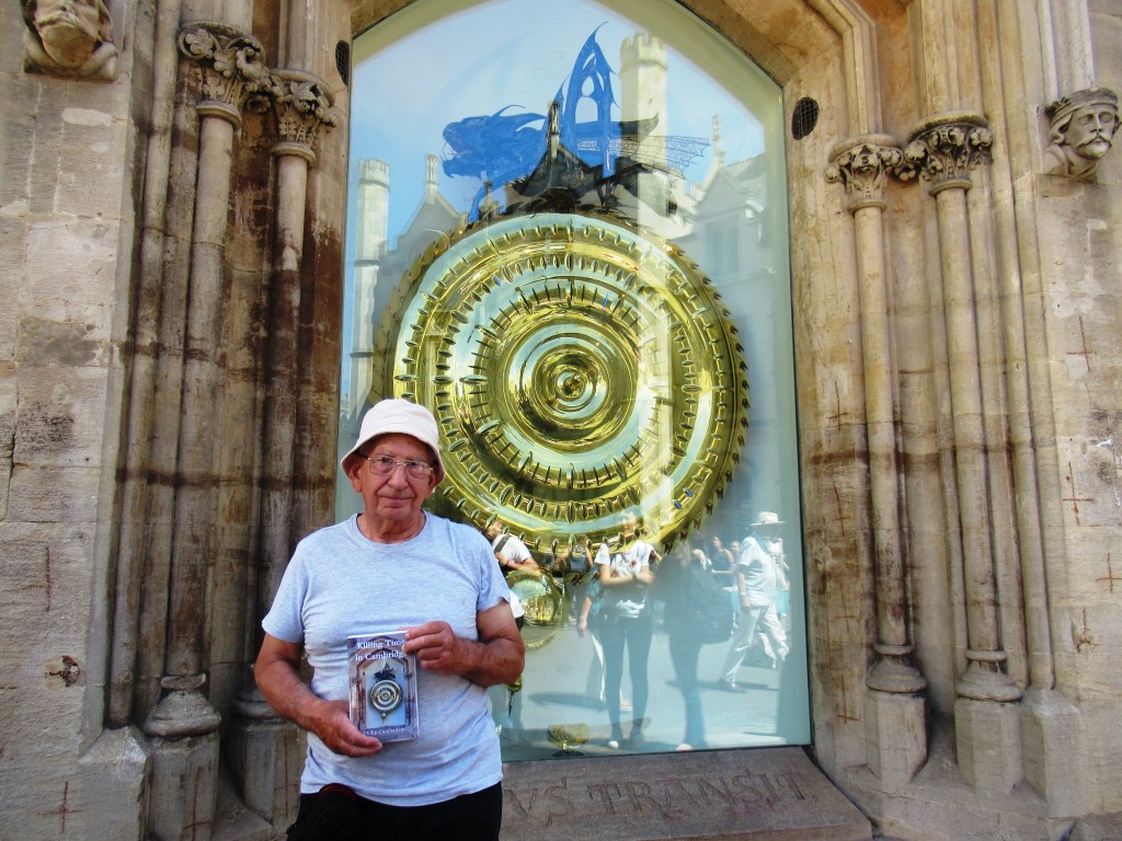 Me with my book, Killing Time in Cambridge with the Grasshopper Chronophage at Corpus Christi College Cambridge
